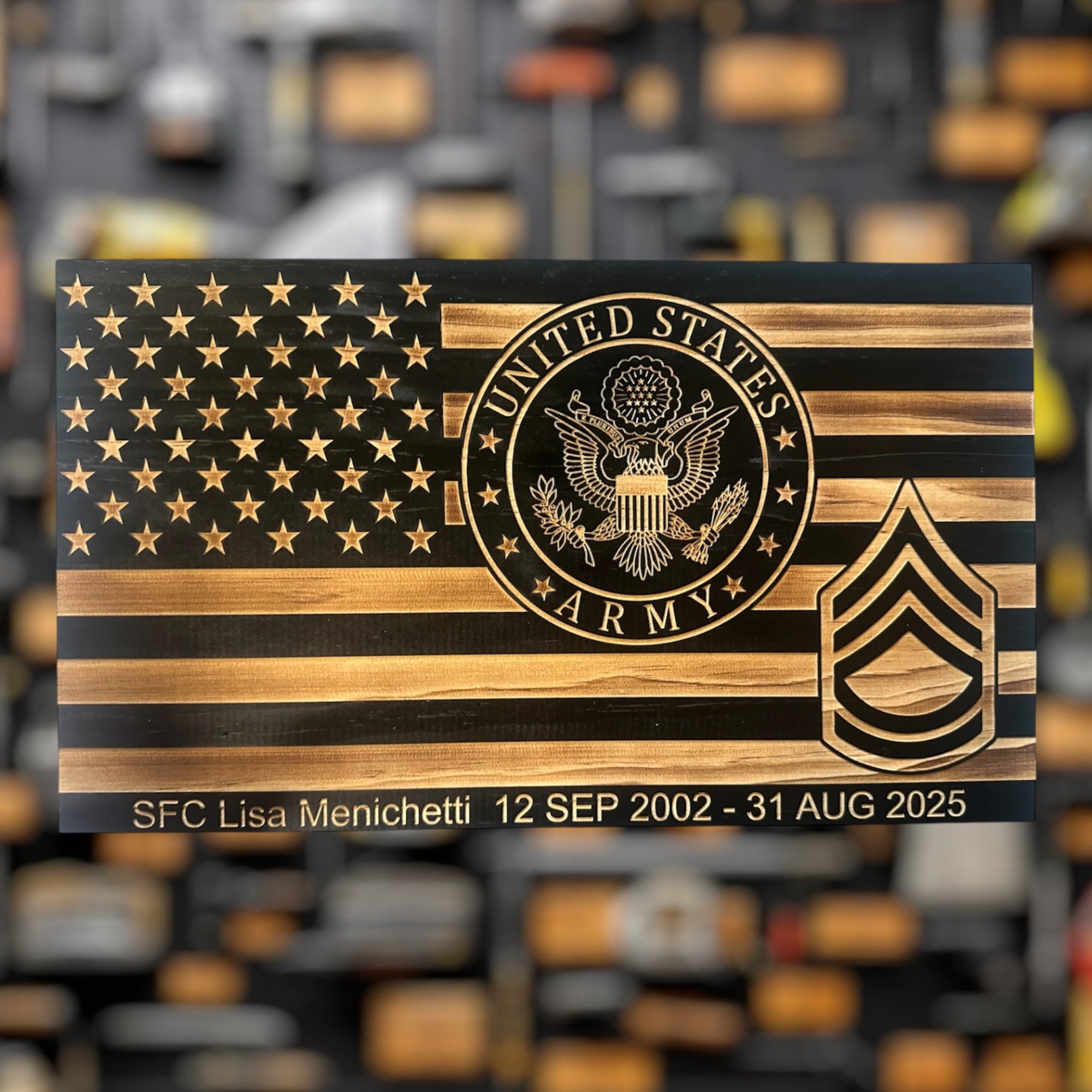 Wooden plaque military gift with U.S. Army emblem SFC rank and details on a blurred background