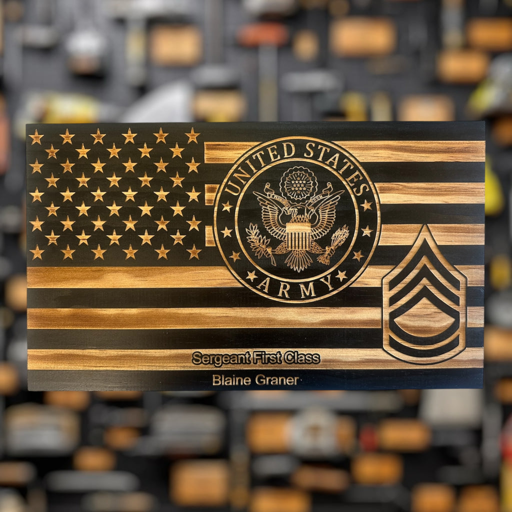 Wooden plaque military gift with U.S. Army emblem and 'Sergeant First Class' insignia on a blurred background